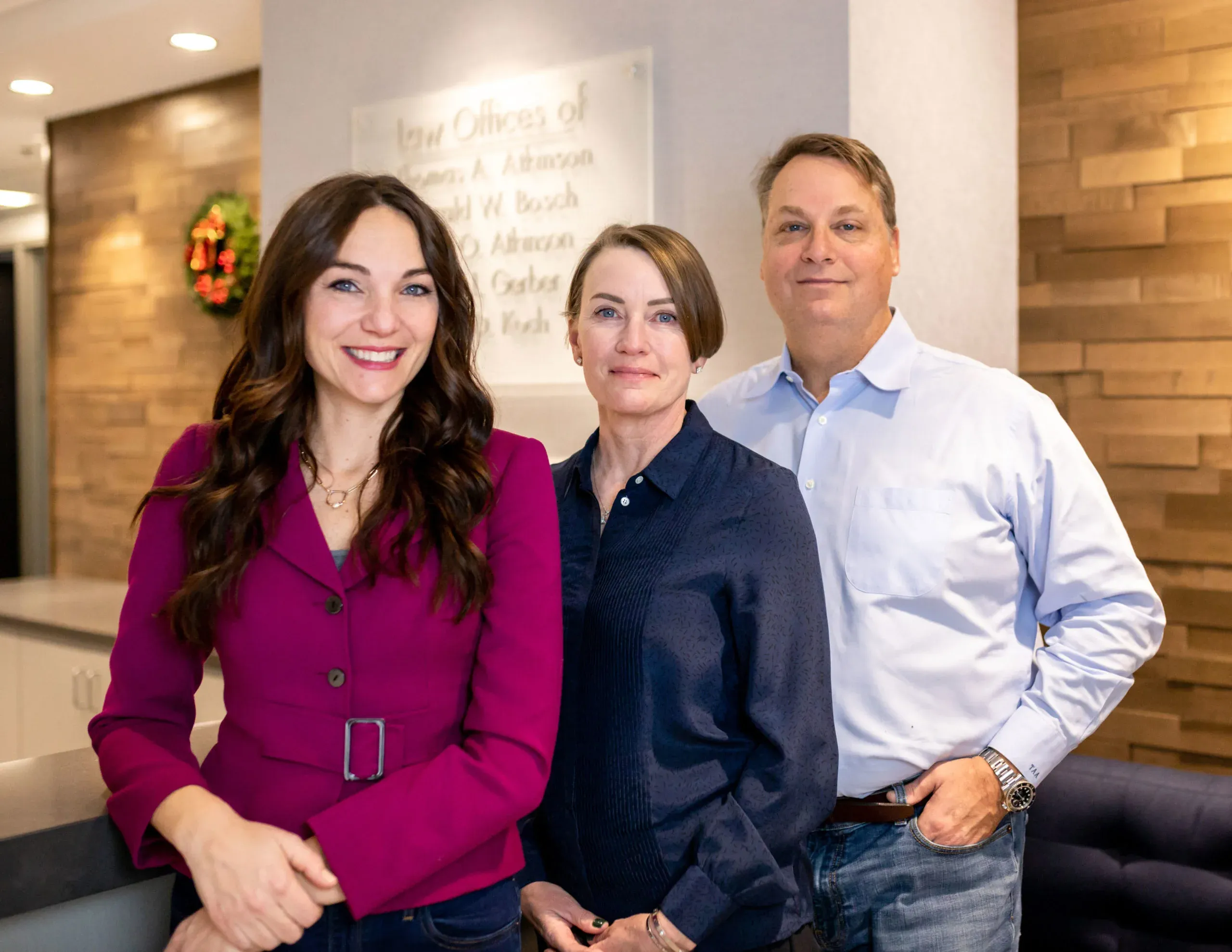 Group photo of attorneys Tom Atkinson, Kerry Atkinson and Dana Gerber